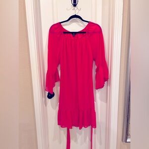Stunning Pink sheer dress with ruffle details. Size medium. Lined.